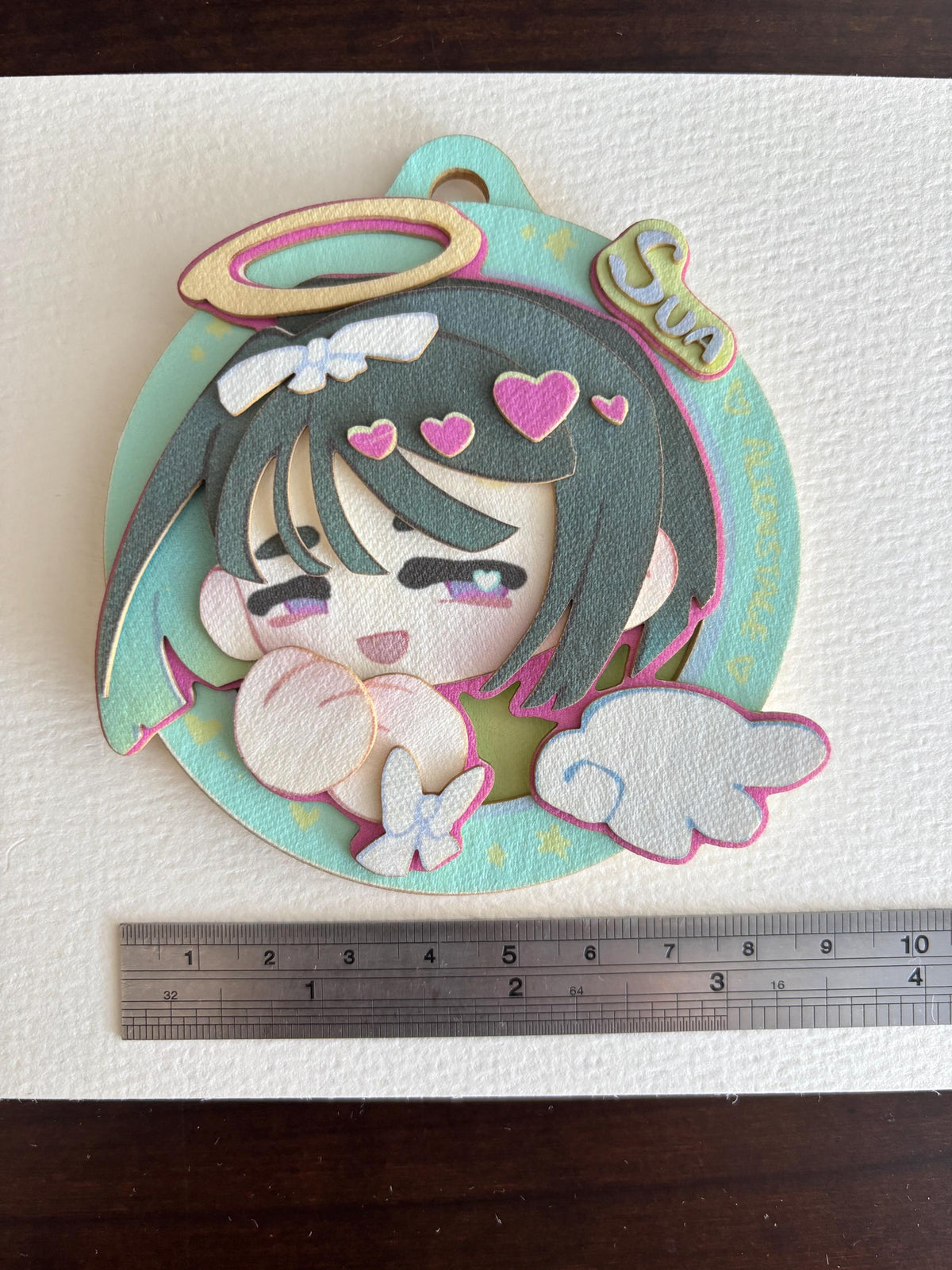 Sua | ALNST | paper biscuit, charm/ornament | ~10x9cm