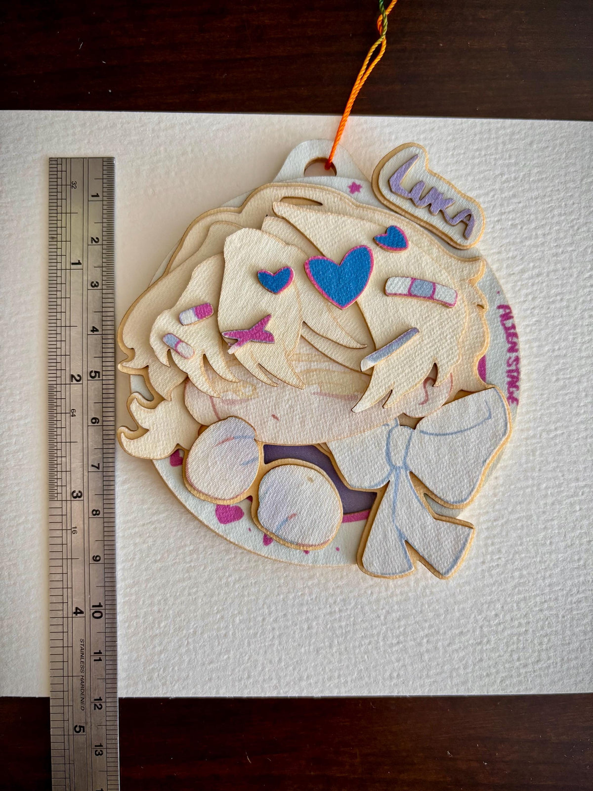 Luka | ALNST | paper biscuit, charm/ornament | ~10x9cm