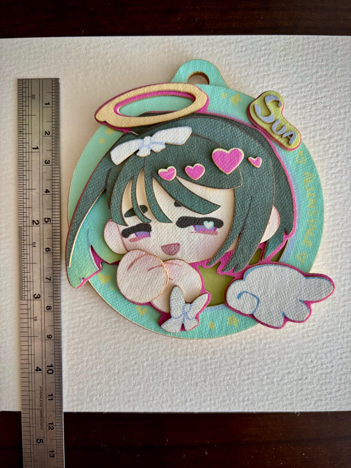 Sua | ALNST | paper biscuit, charm/ornament | ~10x9cm