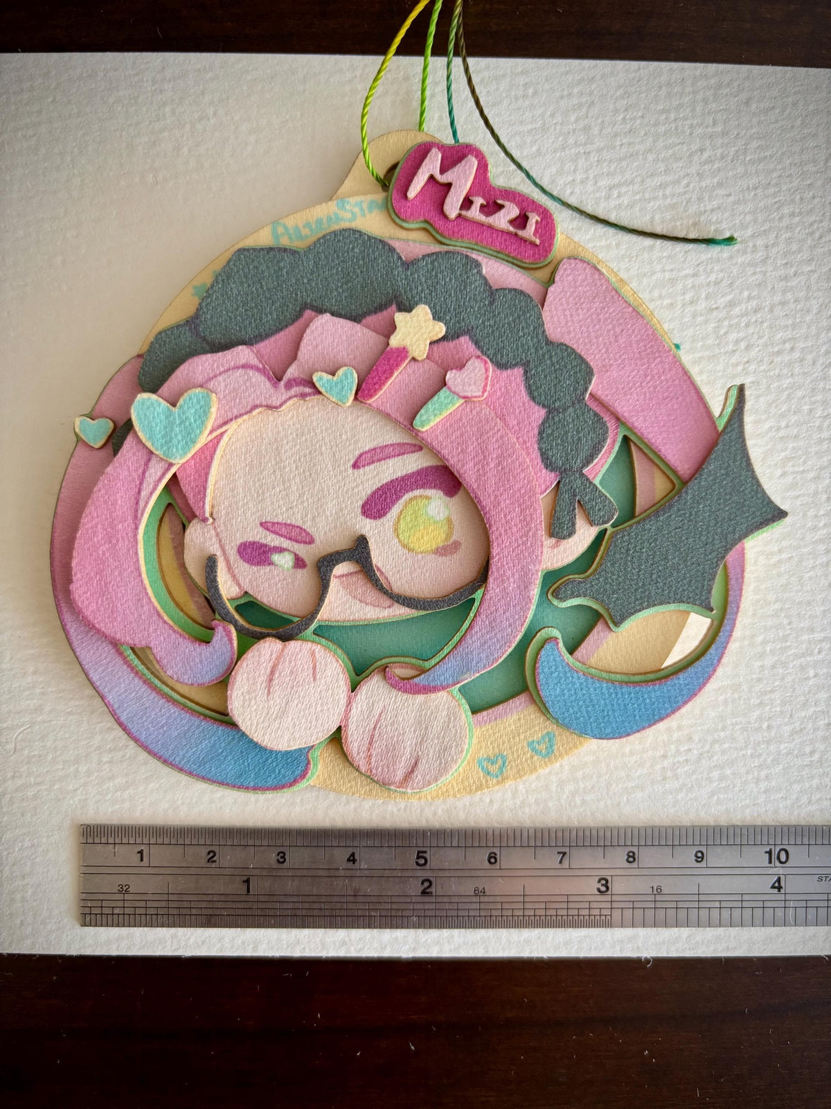 Mizi | ALNST | paper biscuit, charm/ornament | ~10x9cm