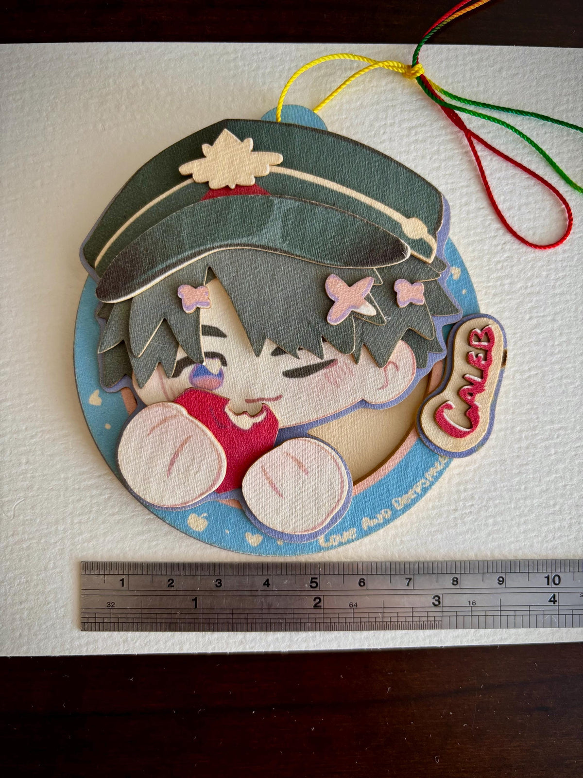 Caleb XiaYiZhou | LADS | paper biscuit, charm/ornament | ~10x9cm