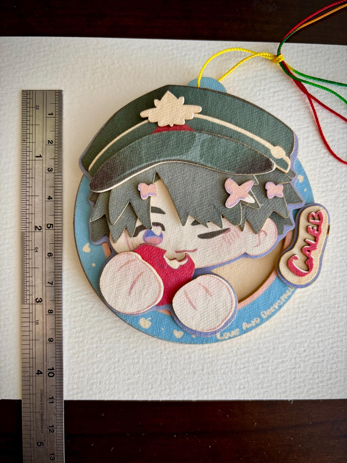 Caleb XiaYiZhou | LADS | paper biscuit, charm/ornament | ~10x9cm